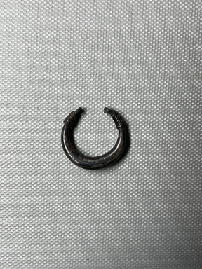  <em>Ring Shank</em>, ca. 1539-1190 B.C.E. Silver, copper, 15/16 in. (2.4 cm). Brooklyn Museum, Charles Edwin Wilbour Fund, 37.721E. Creative Commons-BY (Photo: Brooklyn Museum, CUR.37.721E.JPG)