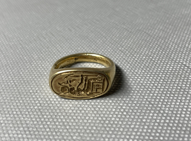  <em>Signet Ring</em>, ca. 1292-1075 B.C.E. Gold, 7/8 x 3/8 x 11/16 in. (2.2 x 1 x 1.8 cm). Brooklyn Museum, Charles Edwin Wilbour Fund, 37.728E. Creative Commons-BY (Photo: Brooklyn Museum, CUR.37.728E_overall.JPG)