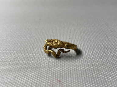  <em>Finger Ring in the Form of a Serpent</em>. Gold, 1/8 × Diam. 11/16 in. (0.3 × 1.8 cm). Brooklyn Museum, Charles Edwin Wilbour Fund, 37.742E. Creative Commons-BY (Photo: Brooklyn Museum, CUR.37.742E.JPG)