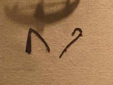  <em>Amulet Representing the Shepherd’s Crook</em>, 664–343 B.C.E. Electrum, 1 3/8 x 3/8 in. (3.5 x 0.9 cm). Brooklyn Museum, Charles Edwin Wilbour Fund, 37.794E. Creative Commons-BY (Photo: , CUR.37.793E_37.794E_wwg8.jpg)