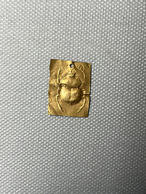  <em>Small Plaque with Scarabeus in Relief</em>, 305-30 B.C.E. Gold, 7/8 × 5/8 (2.2 × 1.6). Brooklyn Museum, Charles Edwin Wilbour Fund, 37.800E. Creative Commons-BY (Photo: Brooklyn Museum, CUR.37.800E_overall.JPG)