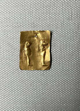  <em>Plaque with the Minor Gods Hapi and Qebehseneuf in Relief</em>, 305–30 B.C.E. Gold, 1 × 3/4 (2.5 × 1.9). Brooklyn Museum, Charles Edwin Wilbour Fund, 37.817E. Creative Commons-BY (Photo: Brooklyn Museum, CUR.37.817E_overall.JPG)