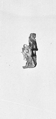  <em>Amulet Representing a Funerary God</em>, ca. 760-656 B.C.E or 305-30 B.C.E. Gold, 13/16 × 11/16 in. (2 × 1.8 cm). Brooklyn Museum, Charles Edwin Wilbour Fund, 37.820E. Creative Commons-BY (Photo: Brooklyn Museum, CUR.37.820E_37.814E_NegGRPA_cropped_bw.jpg)
