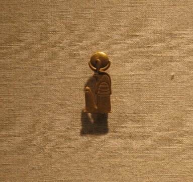  <em>Khonsu Amulet</em>, 664–343 B.C.E. Gold, 1 x 7/16 x 1/4 in. (2.6 x 1.1 x 0.6 cm). Brooklyn Museum, Charles Edwin Wilbour Fund, 37.825E. Creative Commons-BY (Photo: Brooklyn Museum, CUR.37.825E_wwg8.jpg)