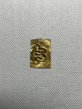  <em>Small Piece of Modern Sheet Gold Giving the Impression of the Die, 37.840E</em>. Sheet gold Brooklyn Museum, Charles Edwin Wilbour Fund, 37.840Ed. Creative Commons-BY (Photo: Brooklyn Museum, CUR.37.840Ed_overall.JPG)