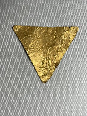  <em>Triangular Piece of Sheet Gold from a Mummy</em>. Gold Brooklyn Museum, Charles Edwin Wilbour Fund, 37.856E. Creative Commons-BY (Photo: Brooklyn Museum, CUR.37.856E_overall01.JPG)