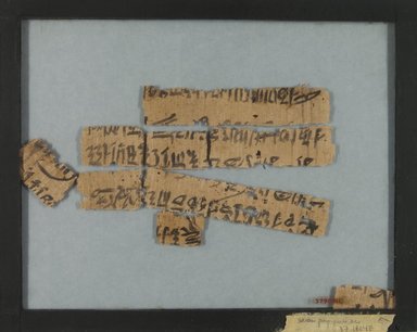  <em>Papyrus Inscribed in Hieratic</em>, ca. 1292–1190 B.C.E. Papyrus, ink, Glass: 7 5/8 x 9 9/16 in. (19.3 x 24.3 cm). Brooklyn Museum, Charles Edwin Wilbour Fund, 37.903E (Photo: Brooklyn Museum, CUR.37.903E_verso_IMLS_PS5.jpg)