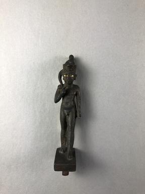  <em>Small Statuette of the Child Horus</em>, 305-30 B.C.E. Bronze, 3 11/16 × 13/16 × 1 1/16 in. (9.3 × 2 × 2.7 cm). Brooklyn Museum, Charles Edwin Wilbour Fund, 37.933E. Creative Commons-BY (Photo: , CUR.37.933E_view01.jpg)