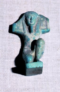  <em>Shu Amulet</em>, 664–30 B.C.E. Faience, 2 9/16 × 1 1/2 × 1 1/4 in. (6.5 × 3.8 × 3.1 cm). Brooklyn Museum, Charles Edwin Wilbour Fund, 37.953E. Creative Commons-BY (Photo: Brooklyn Museum, CUR.37.953E.jpg)