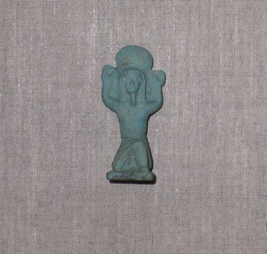  <em>Figure of Shu</em>, ca. 1070.-653 B.C.E. Faience, 1 3/4 × 7/8 × 3/4 in. (4.5 × 2.2 × 1.9 cm). Brooklyn Museum, Charles Edwin Wilbour Fund, 37.954E. Creative Commons-BY (Photo: Brooklyn Museum, CUR.37.954E_wwgA-1.jpg)