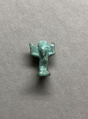  <em>Shu Amulet</em>, 664-332 B.C.E. Faience, 9/16 × 7/16 × 5/16 in. (1.5 × 1.1 × 0.9 cm). Brooklyn Museum, Charles Edwin Wilbour Fund, 37.956E. Creative Commons-BY (Photo: , CUR.37.956E_view01.jpg)