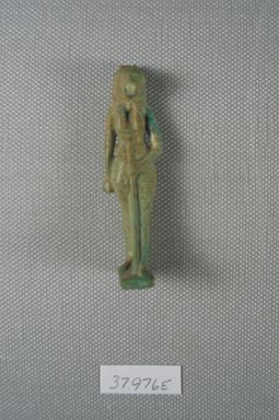  <em>Bastet Amulet</em>, 664-332 B.C.E. Faience, 2 1/2 x 11/16 in. (6.4 x 1.8 cm). Brooklyn Museum, Charles Edwin Wilbour Fund, 37.976E. Creative Commons-BY (Photo: Brooklyn Museum, CUR.37.976E_front.jpg)