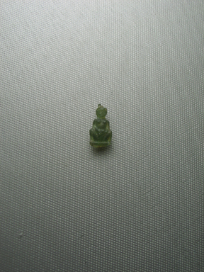  <em>Amulet of Baubo</em>, 3rd century B.C.E.-2nd century C.E. Glass, 7/8 x 1/2 x 1/4 in. (2.2 x 1.2 x 0.6 cm). Brooklyn Museum, Charles Edwin Wilbour Fund, 37.981E. Creative Commons-BY (Photo: Brooklyn Museum, CUR.37.981E_view01.jpg)