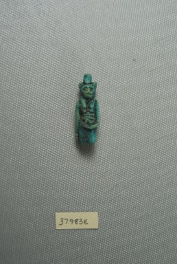  <em>Bastet Amulet</em>, 664-30 B.C.E. Faience, Height: 1 7/16 in. (3.6 cm). Brooklyn Museum, Charles Edwin Wilbour Fund, 37.983E. Creative Commons-BY (Photo: Brooklyn Museum, CUR.37.983E_View1.jpg)