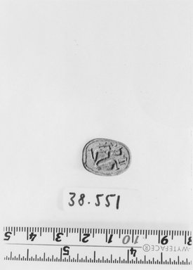 Nubian. <em>Scarab</em>, ca. 1352–1075 B.C.E. Faience, 3/8 x 9/16 x 3/4 in. (0.9 x 1.4 x 1.9 cm). Brooklyn Museum, Gift of the Egypt Exploration Society, 38.551. Creative Commons-BY (Photo: Brooklyn Museum, CUR.38.551_negA_print_bw.jpg)