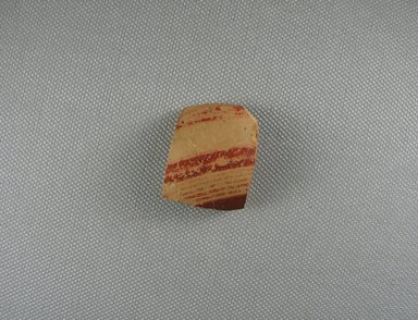 Mycenaean. <em>Jar Fragment</em>, ca. 1425–1300 B.C.E. Clay, pigment, 1 x 3/16 x 1 5/16 in. (2.6 x 0.4 x 3.3 cm). Brooklyn Museum, Gift of the Egypt Exploration Society, 38.556b. Creative Commons-BY (Photo: Brooklyn Museum, CUR.38.556b_view1.jpg)