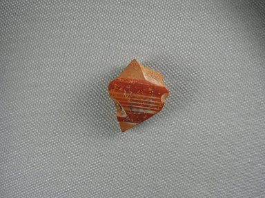 Mycenaean. <em>Jar Fragment</em>, ca. 1425-1300 B.C.E. Clay, pigment, 1 x 3/16 x 1 1/4 in. (2.5 x 0.4 x 3.1 cm). Brooklyn Museum, Gift of the Egypt Exploration Society, 38.556d. Creative Commons-BY (Photo: Brooklyn Museum, CUR.38.556d_view1.jpg)