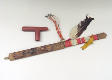Sioux. <em>Pipe with Carved Turtle, Buffalo, and Elk</em>, late 19th century. Catlinite, wood, feather, tin, brass nails, porcupine quills, silk ribbon, 30 1/2 x 6 x 3 in. (77.5 x 15.2 x 7.6 cm). Brooklyn Museum, Dick S. Ramsay Fund, 38.634a-b. Creative Commons-BY (Photo: Brooklyn Museum, CUR.38.634_view1.jpg)