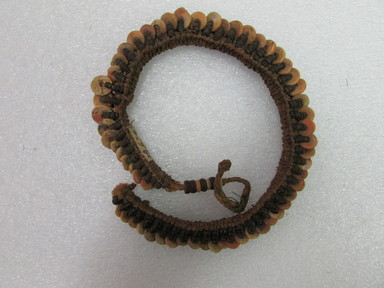 Fijian. <em>Necklace</em>. Shell, coconut shell, fiber, 7 7/8 x 6 1/8 in. (20 x 15.5 cm). Brooklyn Museum, Dick S. Ramsay Fund, 38.639. Creative Commons-BY (Photo: , CUR.38.639_view01.jpg)