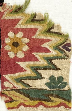Coptic. <em>Fragment with Botanical and Geometric Decoration</em>, 5th-6th century C.E. Flax, wool, 7 1/4 x 4 1/4 in. (18.4 x 10.8 cm). Brooklyn Museum, Charles Edwin Wilbour Fund, 38.668. Creative Commons-BY (Photo: Brooklyn Museum (in collaboration with Index of Christian Art, Princeton University), CUR.38.668_ICA.jpg)