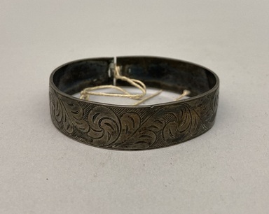 Possibly Haida. <em>Bracelet with Foliate Decoration</em>, early 20th century. Silver, 1/2 × 2 1/4 × 2 1/8 in. (1.3 × 5.7 × 5.4 cm). Brooklyn Museum, Gift of Mrs. Frederic B. Pratt, 38.99. Creative Commons-BY (Photo: Brooklyn Museum, CUR.38.99.jpg)