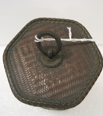  <em>Tall Basket with Cover</em>, 19th century. Reed, 6 x 4 1/8 in. (15.3 x 10.5 cm). Brooklyn Museum, Gift of Mrs. Frederic B. Pratt, 39.117a-b. Creative Commons-BY (Photo: Brooklyn Museum, CUR.39.117a-b_top.jpg)