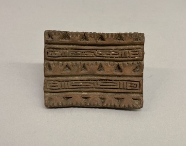 Possibly Aztec. <em>Stamp</em>. Dark brown pottery, 2 1/4 × 1 3/4 × 2 15/16 in. (5.7 × 4.4 × 7.5 cm). Brooklyn Museum, Ella C. Woodward Memorial Fund, 39.123.101. Creative Commons-BY (Photo: Brooklyn Museum, CUR.39.123.101.jpg)