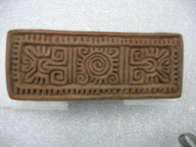 Possibly Aztec. <em>Stamp</em>, 1000–1500. Ceramic, 4 1/4 x 2 1/8 x 1 5/8 in. (10.8 x 5.4 x 4.1 cm). Brooklyn Museum, Ella C. Woodward Memorial Fund, 39.123.14. Creative Commons-BY (Photo: Brooklyn Museum, CUR.39.123.14.jpg)