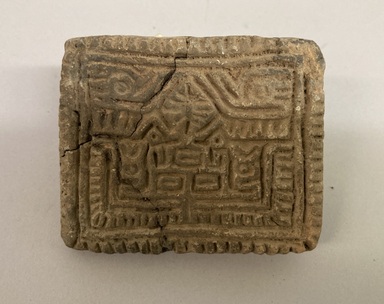 Possibly Aztec. <em>Stamp</em>. Light brown pottery, 1 3/16 x 2 11/16 x 2 3/16 in. (3 x 6.8 x 5.6 cm). Brooklyn Museum, Ella C. Woodward Memorial Fund, 39.123.4. Creative Commons-BY (Photo: Brooklyn Museum, CUR.39.123.4.jpg)