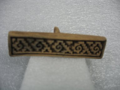  <em>Stamp</em>, 1000–1500. Ceramic, 7/8 x 1 3/8 x 3 1/2 in. (2.2 x 3.5 x 8.9 cm). Brooklyn Museum, Ella C. Woodward Memorial Fund, 39.123.81. Creative Commons-BY (Photo: Brooklyn Museum, CUR.39.123.81.jpg)