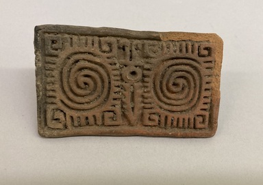 Possibly Aztec. <em>Stamp</em>. Red pottery, 1 15/16 × 1 1/2 × 3 5/16 in. (4.9 × 3.8 × 8.4 cm). Brooklyn Museum, Ella C. Woodward Memorial Fund, 39.123.92. Creative Commons-BY (Photo: Brooklyn Museum, CUR.39.123.92.jpg)