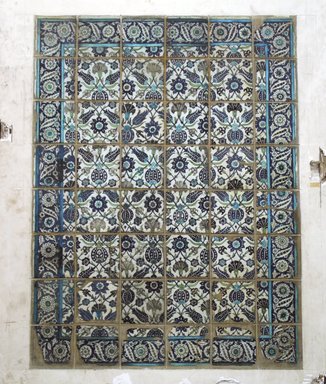  <em>Panel of Tiles</em>, late 16th-17th century. Ceramic; fritware, painted in black, cobalt blue, green, and turquoise on a white slip ground under a transparent glaze, 6 x 4 3/6 feet (184 x 138 cm). Brooklyn Museum, Gift of Alvin Devereux, 39.407.1-.54. Creative Commons-BY (Photo: Brooklyn Museum, CUR.39.407.1-.49.jpg)