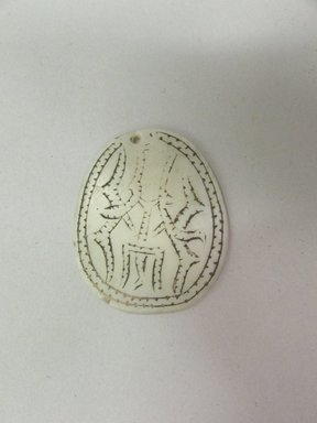 Solomon Islander. <em>Ornament (Ulute or Papafita)</em>. Shell, pigment, 1 3/8 x 1 5/8 in. (3.5 x 4.1 cm). Brooklyn Museum, Ella C. Woodward Memorial Fund, 40.922. Creative Commons-BY (Photo: Brooklyn Museum, CUR.40.922.jpg)