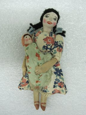  <em>Pair of Dolls Representing Chilean Dancers</em>, 20th century. Cotton, wool, Woman (A)  6 7/16 x 2 3/4 x 1 3/8 in. (16.4 x 7 x 3.5 cm). Brooklyn Museum, Museum Expedition 1941, Frank L. Babbott Fund, 41.1274.25a-b. Creative Commons-BY (Photo: Brooklyn Museum, CUR.41.1274.25a-b_detail1.jpg)