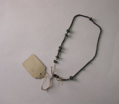  <em>String of Beads</em>. Silver, stone, cotton., 1/4 x 1/8 x 12 1/2 in. (0.6 x 0.3 x 31.8 cm). Brooklyn Museum, Museum Expedition 1941, Frank L. Babbott Fund, 41.1275.351. Creative Commons-BY (Photo: Brooklyn Museum, CUR.41.1275.351.jpg)