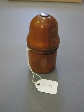  <em>Smelling Salts Bottle</em>, ca. 1840. Satinwood, glass, H: 2 7/8 in. (7.3 cm). Brooklyn Museum, Gift of Mary E. Simpson, 42.138. Creative Commons-BY (Photo: Brooklyn Museum, CUR.42.138.jpg)