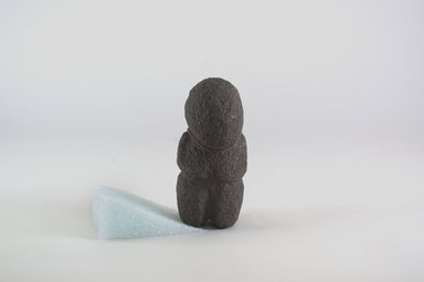 Marquesan. <em>Figure (Tiki Ke'a)</em>, before 1938. Stone, 5 1/4 x 2 3/4 x 2 3/8 in. (13.3 x 7 x 6 cm). Brooklyn Museum, A. Augustus Healy Fund, 42.211.83. Creative Commons-BY (Photo: Brooklyn Museum, CUR.42.211.83_front_PS5.jpg)
