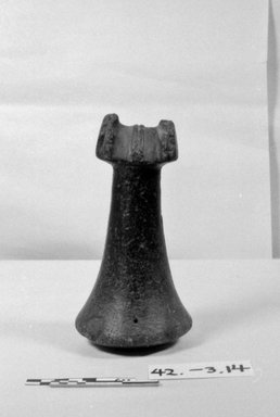 Maohi. <em>Poi Pounder</em>. Black stone, 7 1/16 x 3 3/4 in. (18 x 9.5 cm). Brooklyn Museum, By exchange, 42.243.14. Creative Commons-BY (Photo: Brooklyn Museum, CUR.42.243.14_bw.jpg)