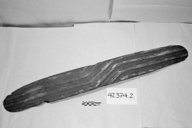 Aboriginal Australian. <em>Shield</em>, 19th or 20th century. Erythresia wood, ochre, 33 1/4 x 4 1/2 x 2 in. (84.5 x 11.4 x 5.1 cm). Brooklyn Museum, Gift of Arthur Wiesenberger, 42.374.2. Creative Commons-BY (Photo: Brooklyn Museum, CUR.42.374.2_bw.jpg)