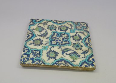  <em>Square Tile</em>, 17th century. Wooden frame, grayish siliceous pottery, 11 x 10 7/8 x 7/8 x 10 7/8 in. (28 x 27.6 x 2.3 x 27.6 cm). Brooklyn Museum, Gift of Alvin Devereux, 43.115. Creative Commons-BY (Photo: Brooklyn Museum, CUR.43.115.jpg)