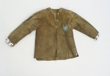 Plains. <em>Tailored Jacket</em>, 1930–1940s. Hide, beads, 29 1/8 x 20 7/8 in. (74 x 53 cm). Brooklyn Museum, Anonymous gift in memory of Dr. Harlow Brooks, 43.201.107. Creative Commons-BY (Photo: Brooklyn Museum, CUR.43.201.107_view1.jpg)