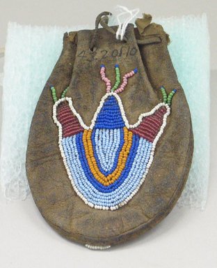 Crow. <em>Drawstring Pouch</em>, 19th century. Beads, moose hide, sinew, cotton thread, 4 1/2 x 3 1/4 in. (11.4 x 8.3 cm). Brooklyn Museum, Anonymous gift in memory of Dr. Harlow Brooks, 43.201.10. Creative Commons-BY (Photo: Brooklyn Museum, CUR.43.201.10_view1.jpg)