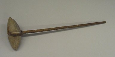 Plains. <em>Hammer with Beaded Handle</em>, 19th century. Catlinite, beads, wood, height: 15 3/4 in. (40 cm); width of stone hammer: 5 1/8 in. (13 cm). Brooklyn Museum, Anonymous gift in memory of Dr. Harlow Brooks, 43.201.128. Creative Commons-BY (Photo: Brooklyn Museum, CUR.43.201.128.jpg)