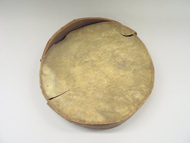 Native American. <em>Hand Drum</em>, 19th century. Hide, wood, silk, height: 3 3/8 in. (8.6 cm). Brooklyn Museum, Anonymous gift in memory of Dr. Harlow Brooks, 43.201.136. Creative Commons-BY (Photo: Brooklyn Museum, CUR.43.201.136_view1.jpg)