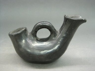 Kah'p'oo Owinge (Santa Clara Pueblo). <em>Pitcher with Double Spout</em>. Clay, slip, 3 15/16 x 6 5/16 in.  (10.0 x 16.0 cm). Brooklyn Museum, Anonymous gift in memory of Dr. Harlow Brooks, 43.201.207. Creative Commons-BY (Photo: Brooklyn Museum, CUR.43.201.207.jpg)