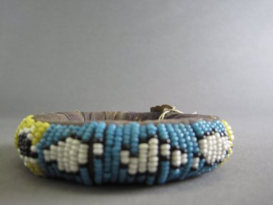 Zulu. <em>Bracelet</em>, early 20th century. Glass beads, cloth, diam: 3 1/2 in. (8.9 cm). Brooklyn Museum, Anonymous gift in memory of Dr. Harlow Brooks, 43.201.40. Creative Commons-BY (Photo: Brooklyn Museum, CUR.43.201.40_side_view2.jpg)