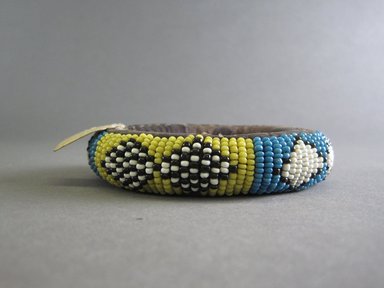 Zulu. <em>Bracelet</em>, early 20th century. Glass beads, cloth, 3 1/2 in. (8.9 cm). Brooklyn Museum, Anonymous gift in memory of Dr. Harlow Brooks, 43.201.41. Creative Commons-BY (Photo: Brooklyn Museum, CUR.43.201.41_side_view1.jpg)