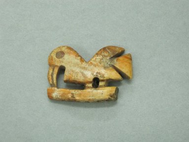  <em>Ornament</em>. Bone, 1 7/16 x 2 3/16 x 3/8 in. (3.7 x 5.5 x 1 cm). Brooklyn Museum, Gift as a memorial to Dr. Harlow Brooks, 43.87.60. Creative Commons-BY (Photo: Brooklyn Museum, CUR.43.87.60_view1.jpg)