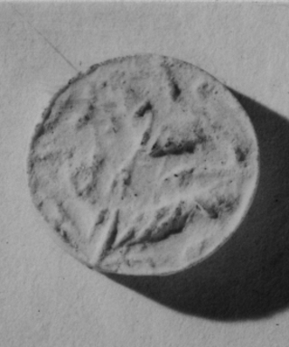 Anatolian. <em>Button Seal</em>, 18th century B.C.E. Steatite, 13/16 x Diam. 3/4 in. (2 x 1.9 cm). Brooklyn Museum, Charles Edwin Wilbour Fund, 44.123.120. Creative Commons-BY (Photo: , CUR.44.123.120_NegID_35.1108GRPA_print_cropped_bw.jpg)