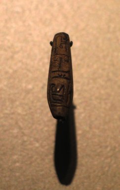  <em>Bead Inscribed for Treasurer Huy</em>, ca. 1479-1390 B.C.E. Steatite, glaze, 3/8 x 1 5/16 in. (1 x 3.3 cm). Brooklyn Museum, Charles Edwin Wilbour Fund, 44.123.144. Creative Commons-BY (Photo: Brooklyn Museum, CUR.44.123.144_erg456.jpg)